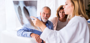 Couple speaking with a doctor