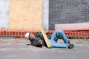 construction worker on the floor after falling