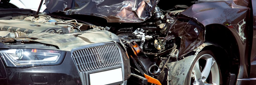 head on collision between two cars