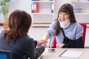 injured employee visiting lawyer