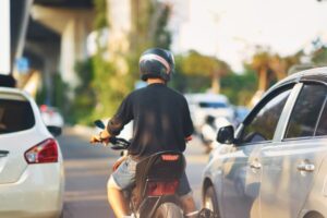 motorcycle driver lane splitting