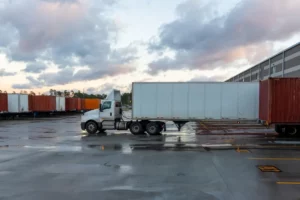 semi truck on the warehouse. shipping and receiving cargo