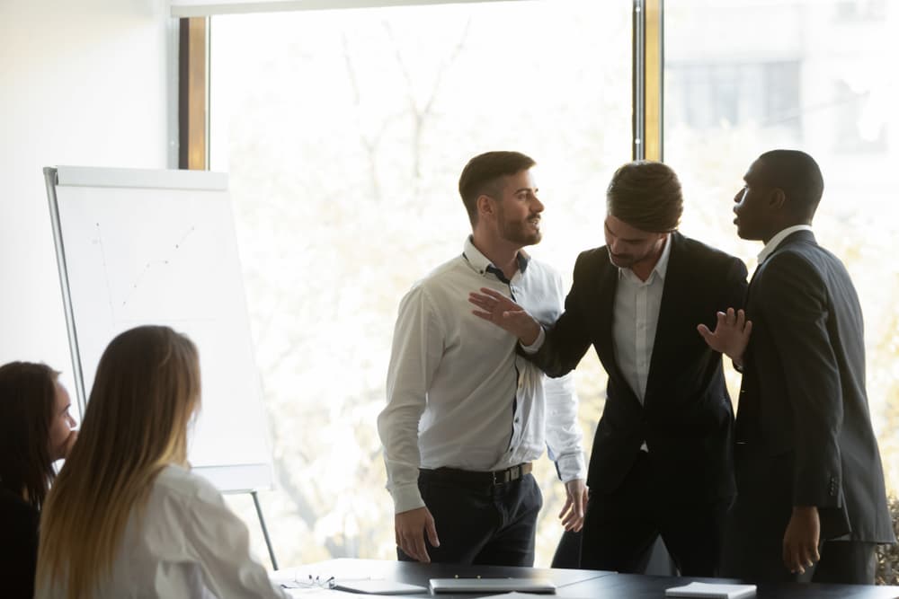 aggressive coworkers having a fight