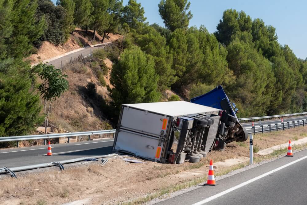 Overturned semi-truck after accident on highway near Summerfield – contact a Summerfield truck accident lawyer for help