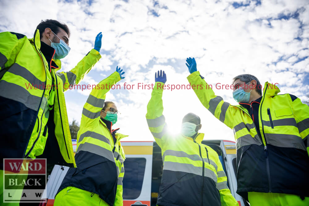 Group of first responders in high-visibility gear celebrating teamwork after a successful emergency response in Greensboro, NC