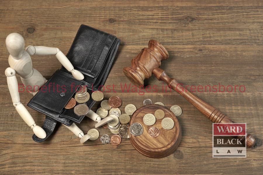 Gavel, wallet, and coins symbolizing lost wage compensation and workers’ rights in Greensboro, NC